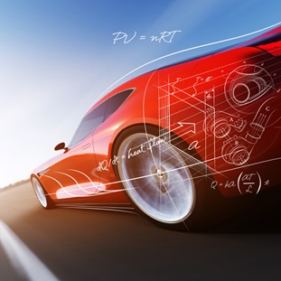 rear left side of red sportscar with engineering details