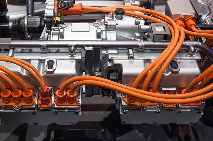 high voltage cables plugged into a machine